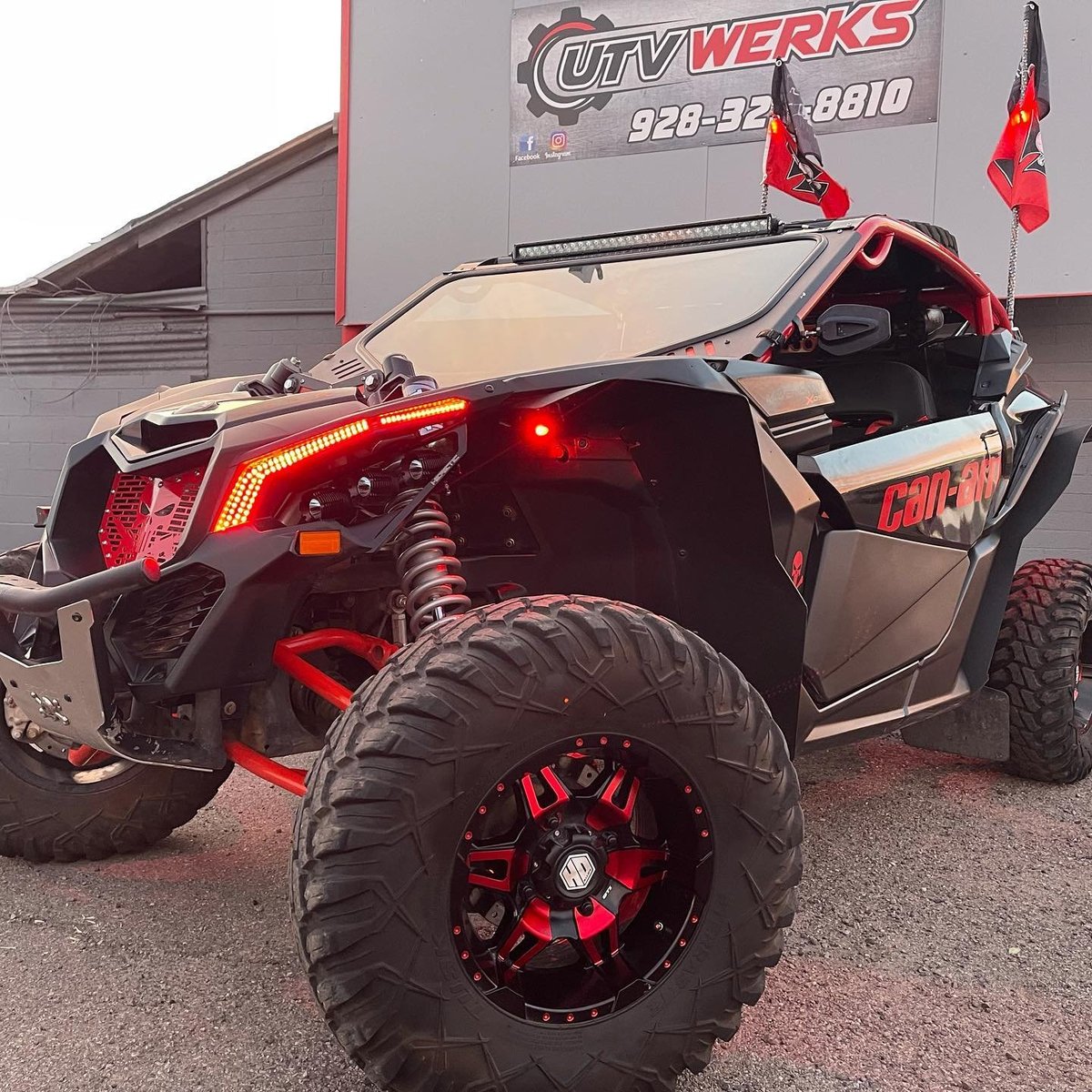 Red and black UTV/dune buggy with custom LED lights